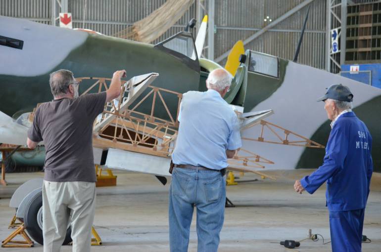 Members of the Friends of the S.A.A.F.Museum working on the full-scale Supermarine Spitfire Mk IX model.